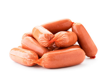 Heap of raw sausages in close-up on a white background. Isolated.