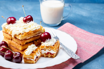 Breakfast, biscuit cake with cherries and milk