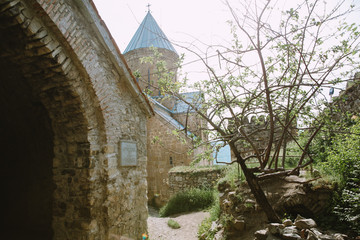 Part view of Ananuri castle fortress on the Aragvi River in Georgia