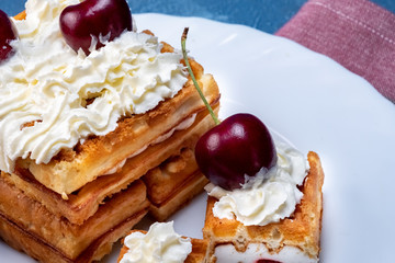 Breakfast, biscuit cake with cherries and milk