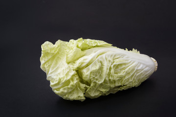 fresh chinese cabbage vegetable isolated on black background