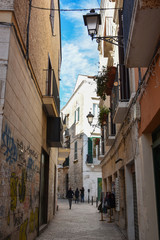 Typical picturesque narrow street in the Old Town of Bari, Puglia region, Southern Italy.