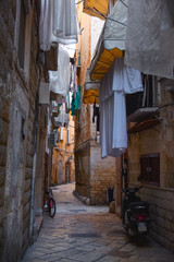 Amazing picturesque narrow street in the Old Town of Bari, Puglia region, Southern Italy.