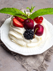Pavlova: A Cake Made From Layers of Meringue, Whipped Cream, and Fresh Berries