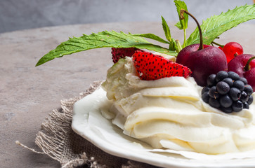 Pavlova: A Cake Made From Layers of Meringue, Whipped Cream, and Fresh Berries