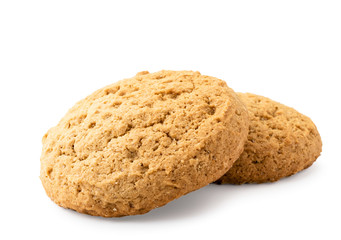 Two oatmeal cookies close-up on a white. Isolated