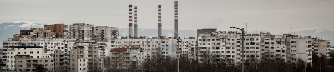 Fototapeta na wymiar Panorama of concrete blocks and a power plant