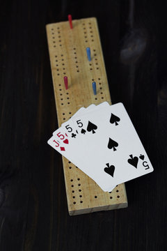 game of cribbage on black background
