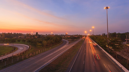 Beautiful highway traffic road at sunset twilight