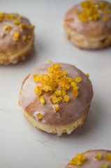 Tasty donuts with rose and icing