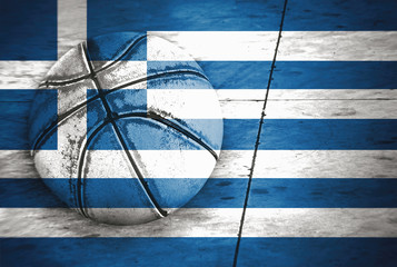 Flag of Greece and basketball ball.