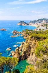 View of Tossa de Mar town from beautiful high sea cliffs, Costa Brava, Spain