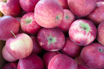 Red ripe apple background. Fresh fruit. Organic fresh produce, top view
