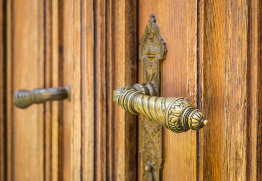 Brass lock on a wooden door