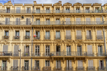 Traditional French Haussmann architecture and residential building in Marseille, France.