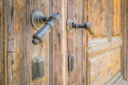 Brass lock on a wooden door