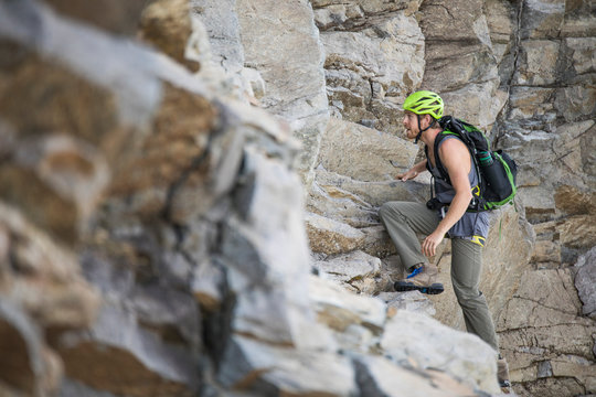 Climber ascends headwall of Douglas Peak, British Columbia.