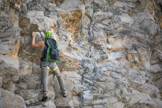 Climber ascends headwall of Douglas Peak, British Columbia.