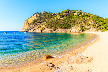 Emerald green sea at Cala Giverola beach, Costa Brava, Spain
