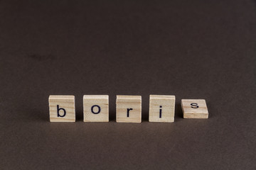 Childrens letter blocks spelling Boris with S fallen. © Andy Chisholm