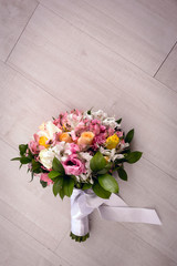 Rustic bridal bouquet with colorful roses. Typical Brazilian bridal bouquet with colorful floral arrangement.