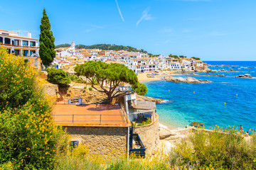 Amazing beach in Calella de Palafrugell, scenic fishing village with white houses and sandy beach with clear blue water, Costa Brava, Catalonia, Spain
