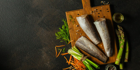 fish raw hake (set of ingredients for cooking). food background. top view. copy space