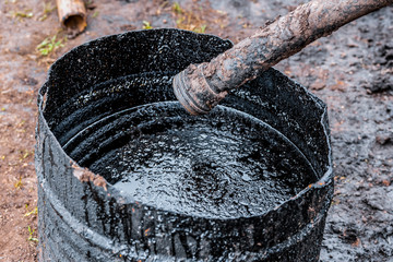 crude oil surface background textured. Pollution with oil products