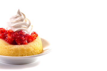 A Single Serve Strawberry Shortcakes with Strawberry Sauce and Whipped Cream