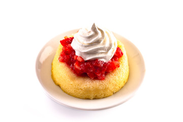 A Single Serve Strawberry Shortcakes with Strawberry Sauce and Whipped Cream