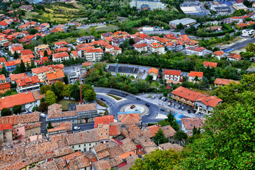 View from the top of San Marino castle towards the sea and over the San Marino villages and Rimini, Italy