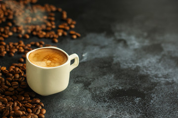 coffee freshly brewed in a white cup serving of beverage (coffee grain). food. top.copy space