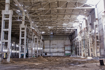  Old industrial building. Abandoned production. Demolition work of an old industrial building.