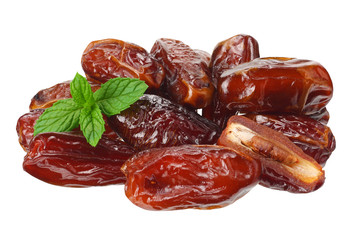 date fruits with green leaves isolated on white background