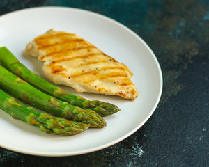 asparagus and chicken grill meat, hollandaise sauce. food background. top