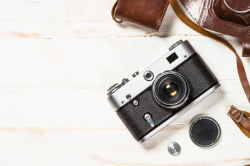 Old film camera on white background.