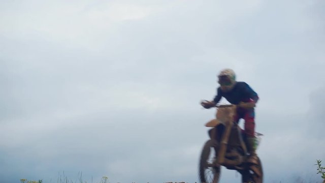 Motorcyclists overcome jumps. Jumping on a motorcycle. Motorcycle racing.1920X1080 Full Hd.
