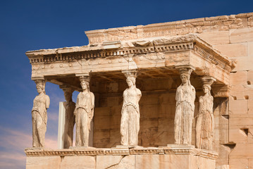 Obraz premium Porch of the Caryatids at famous ancient Erechtheion Greek temple on the north side of the Acropolis of Athens in Greece