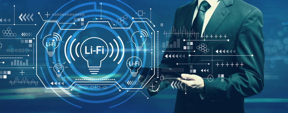 LiFi theme with businessman holding a tablet computer