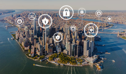 Cyber security theme with aerial view of Manhattan, NY skyline