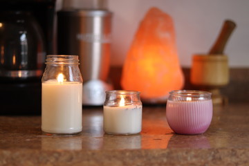 Holistic candles and pink himalayan lamp