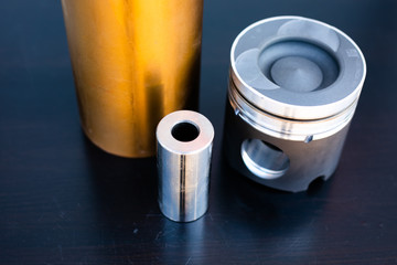 Mechanic opened the locking valve mechanism. Disassemble engine block vehicle. Old motor capital repair. Car service concept