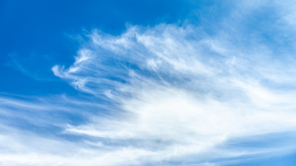Naklejka na ściany i meble Cirrus Clouds With Deep Blue Sky Background