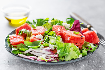 Summer salad with watermelon and salad leaves