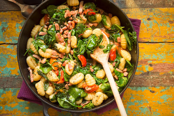 Gnocchi with bacon, spinach & tomatoes 