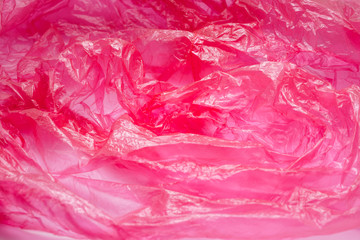 Red Plastic Bag Texture. Abstract Wrinkled Background of Plastic Garbage