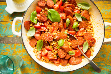 Fried chorizo sausage with chickpeas, tomatoes, lemon & basil 