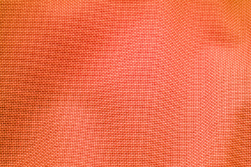 Orange Nylon Fabric Texture Background. Thick Fabric for Backpacks and Sports Equipment