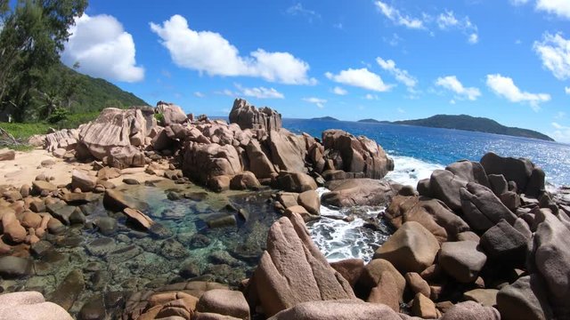 La Digue, Seychelles, natural pool. Scenic view of clear and calm swimming pools at Anse Caiman between Anse Fourmis and Anse Cocos protected by rock formations. Anse Caiman is far from tourist routes