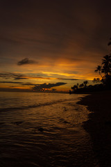 Fototapeta na wymiar Colorful sunrise on the Tambua Sands Beach on Fiji Island, Fiji
